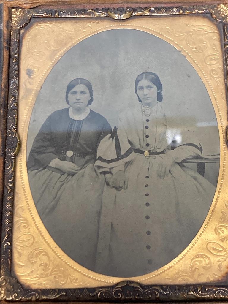 Two framed Ambrotypes, one overpainted